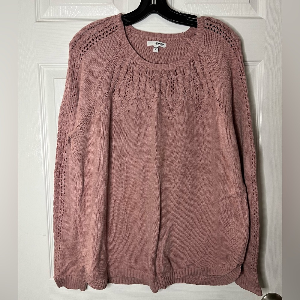 Pink women’s knit sweater